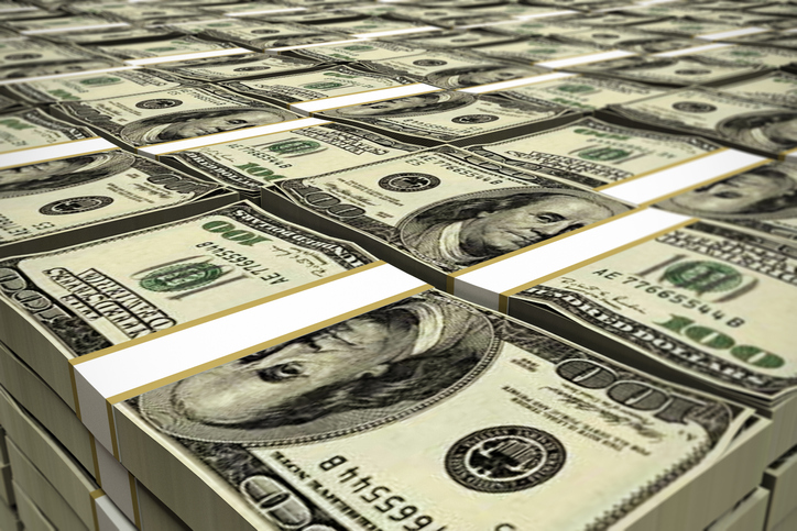 dollars stack - Central Florida Lifestyle