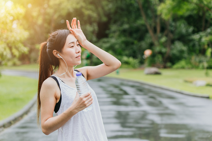asian sport girl drinking water for healthy when outdoor sport hot day - Central Florida Lifestyle