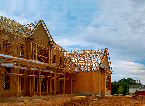framing beam of new home amid crowded housing market