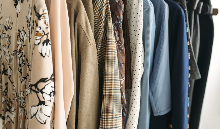 Clothes hanging on hangers.