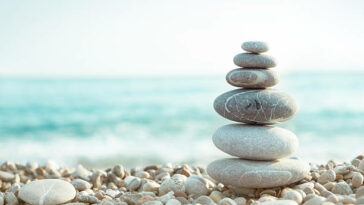gettys image stones stacked on one another at beach