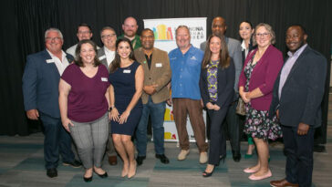 Photo of the Lake Nona Board of Directors at the Orlando Mayor Buddy Dyer luncheon.