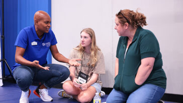 Youth receiving financial classes with Habitat for Humanity