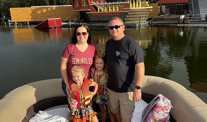 Photo of Candice Postal with her husband and two kids.