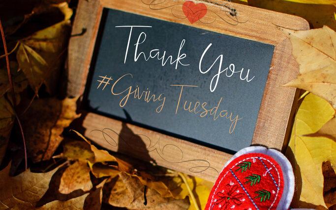 A thank you card with the hashtag words Giving Tuesday #GivingTuesday to thank social media community for donations, support and philanthropy