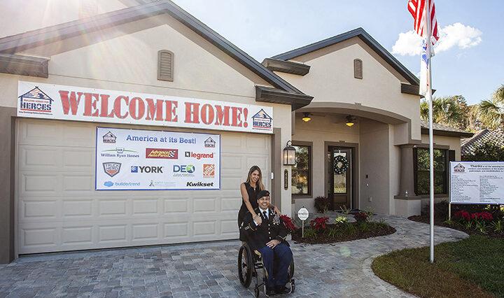 photo of a veteran at a ceremony put on by Building Homes for Heroes.