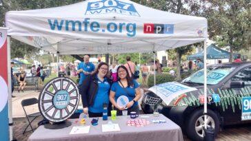 Two women tabling at an event