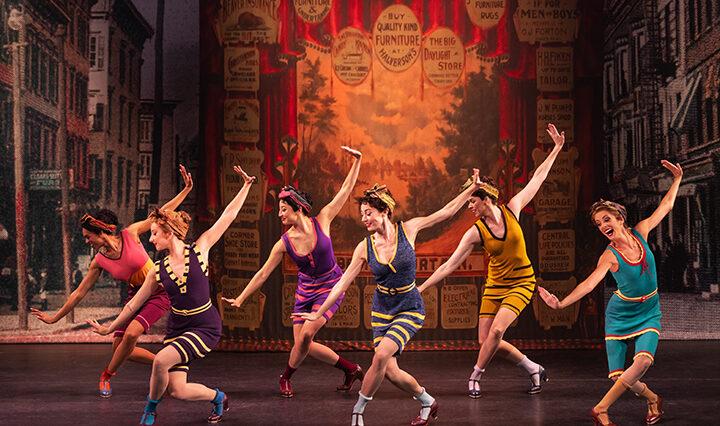 Group of performers on stage during the production of Funny Girl.