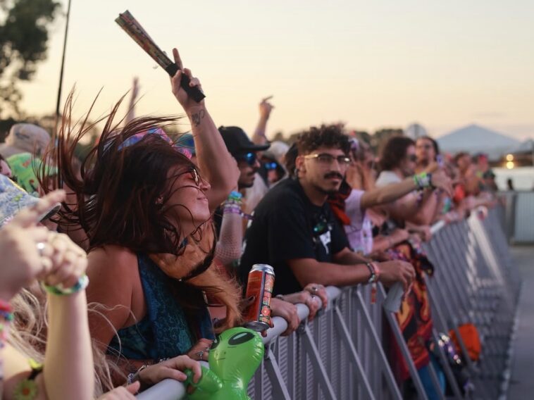 A girl dancing to music at the Florida Groves Festival.