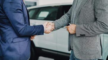 Two business owners handshaking