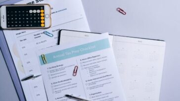 An American expat reviewing cross-border financial documents in Canada